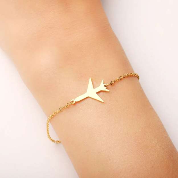 Women's bracelet, gold, made of surgical steel, airplane